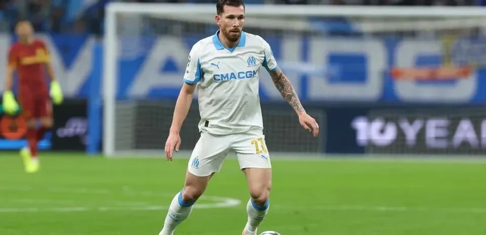 Player dribbling ball during UEFA Champions League match