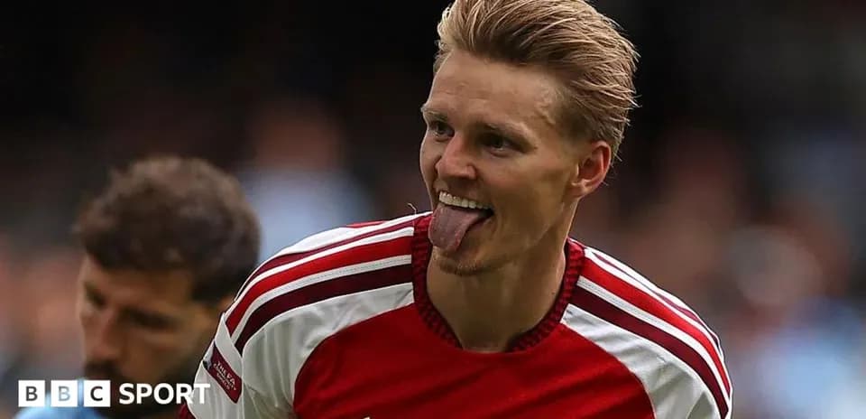 Player celebrating with tongue out during match