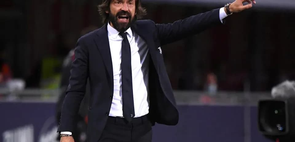 Manager directing players during a match
