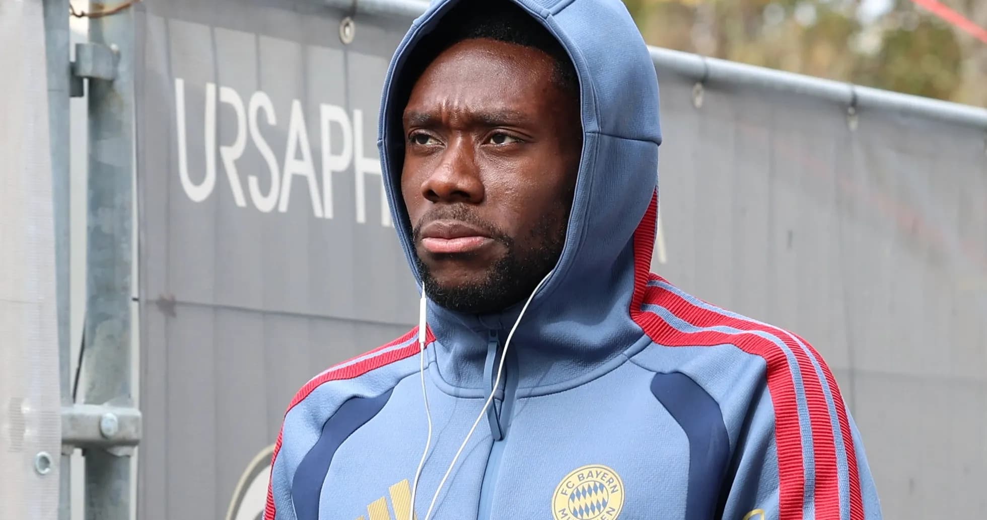 Player wearing Bayern Munich hoodie before training