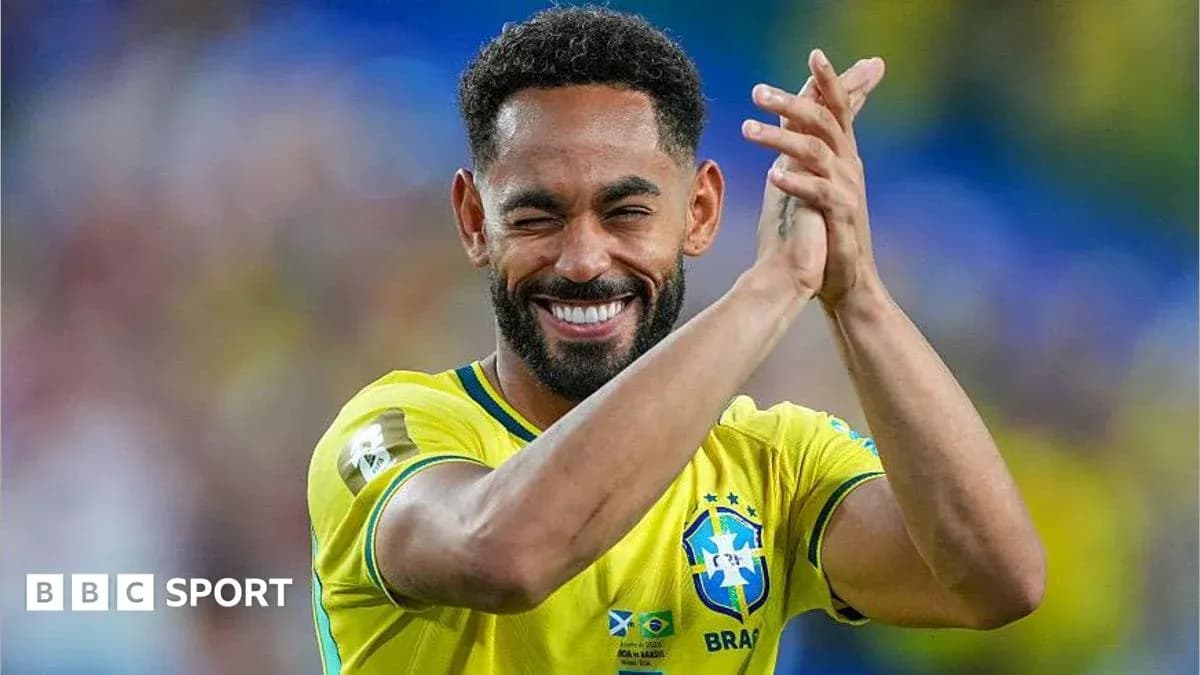 Player celebrating and clapping in Brazil jersey