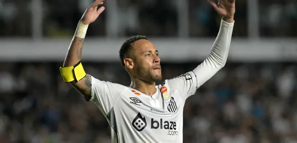 Player celebrating during a match for Santos FC