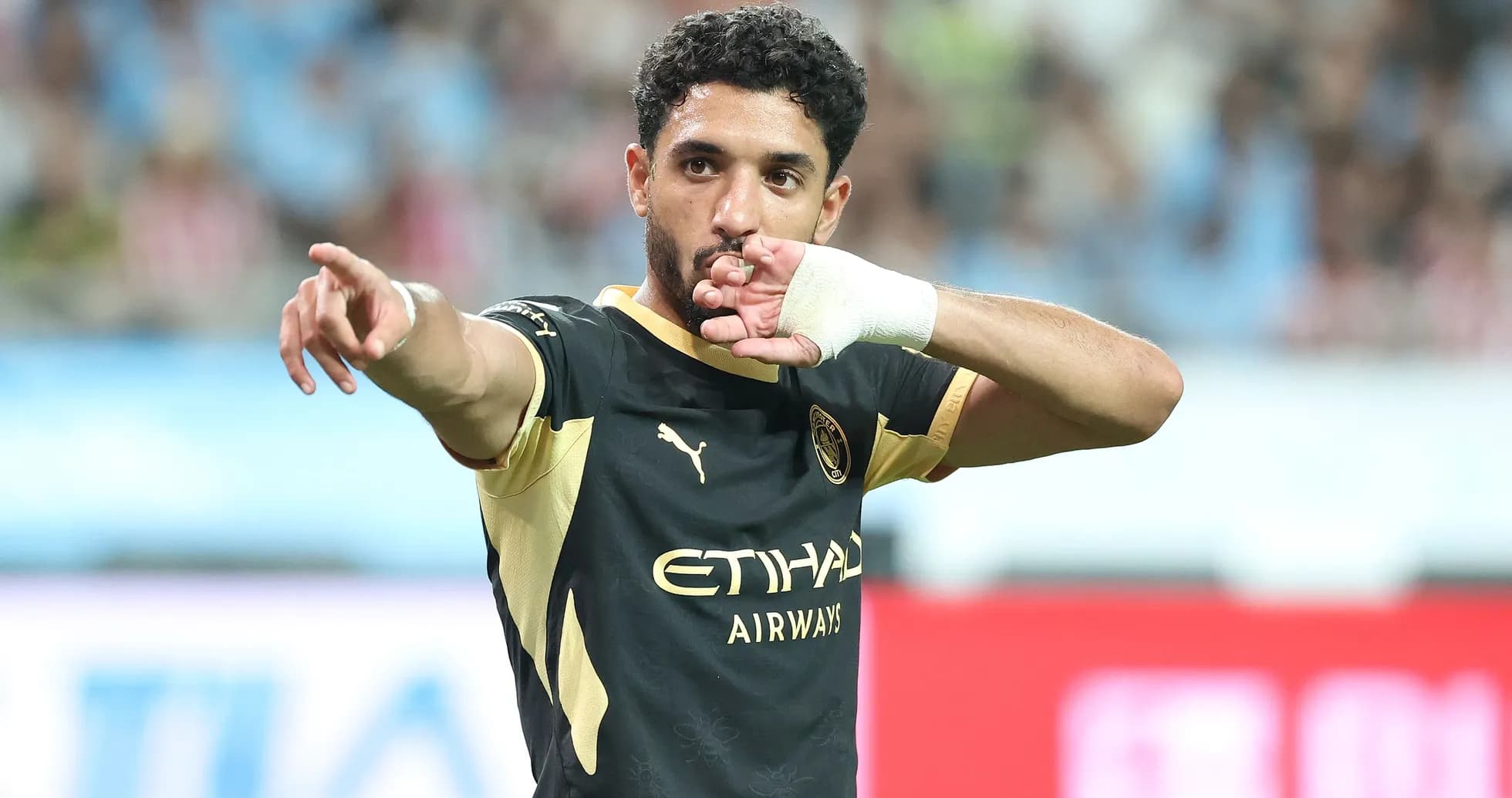 Player celebrating after scoring a goal during match