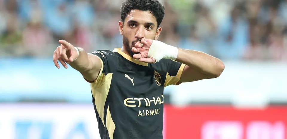 Player celebrating after scoring a goal during match