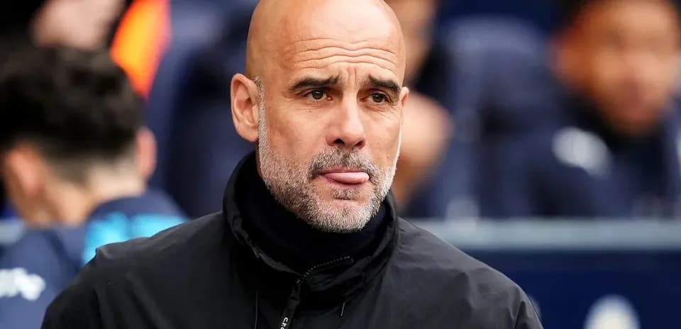 Manager observing from the sidelines during match