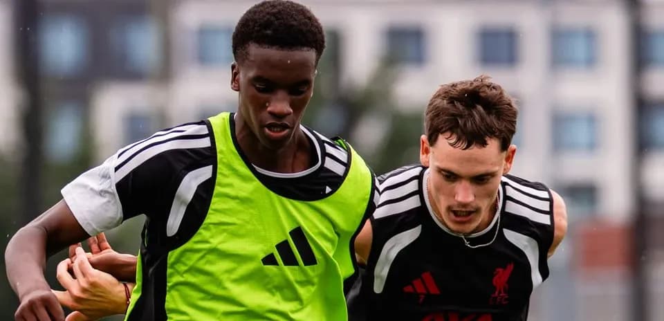 Two players competing for the ball in training
