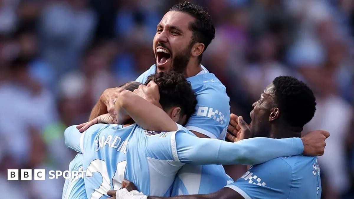 Players celebrating a goal during a match