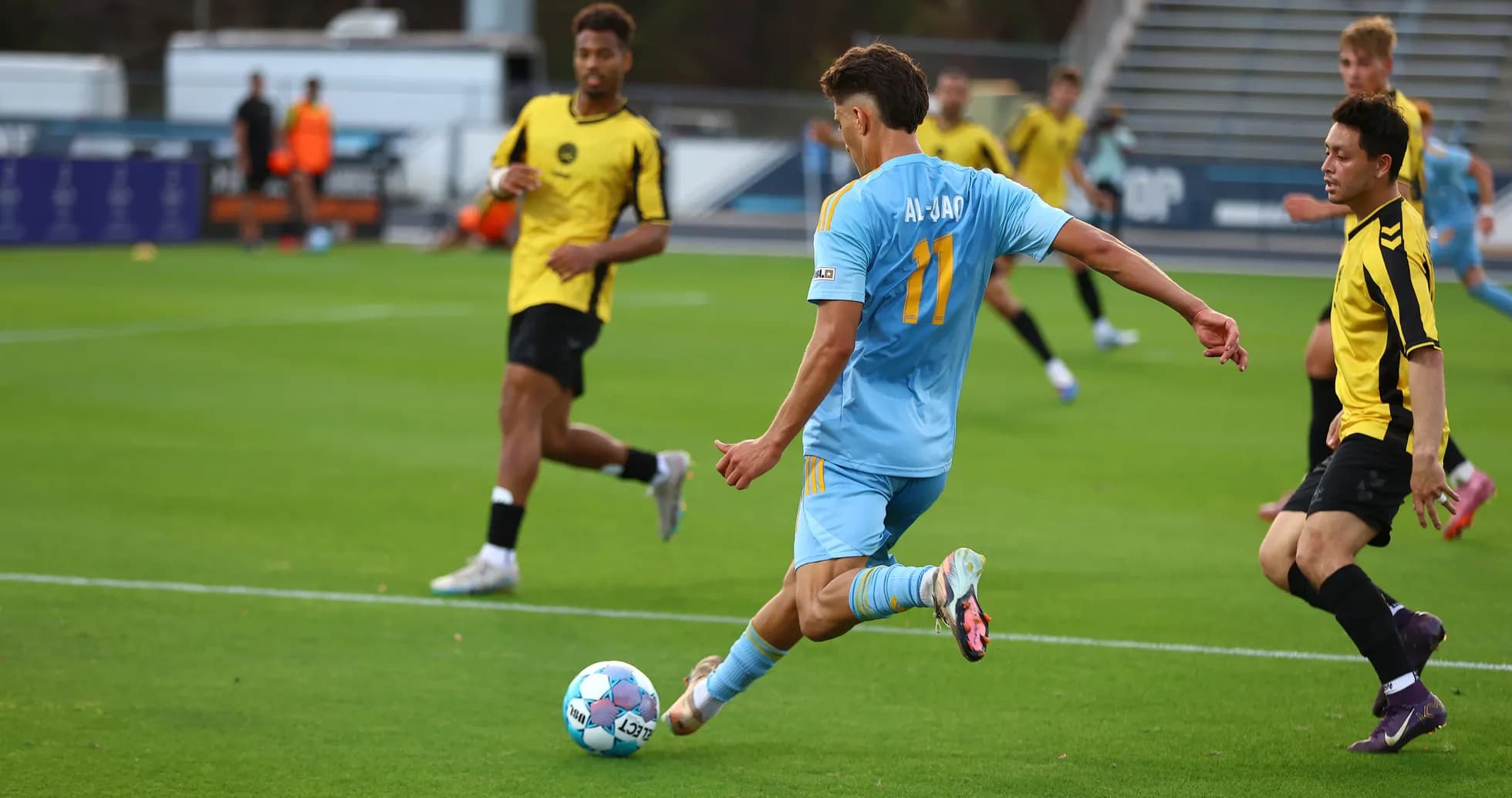 Player from JAX kicking the ball during match