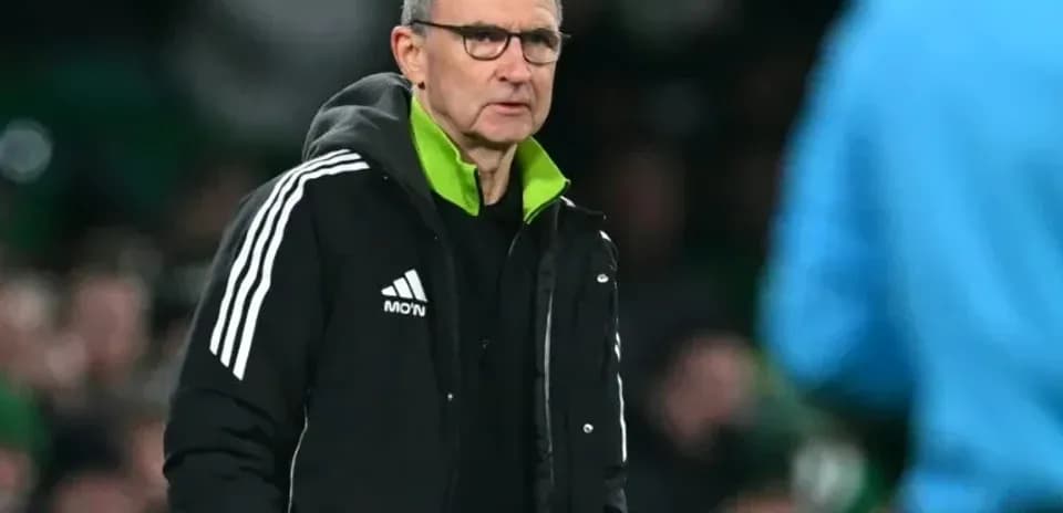 Manager observing the game from the sideline