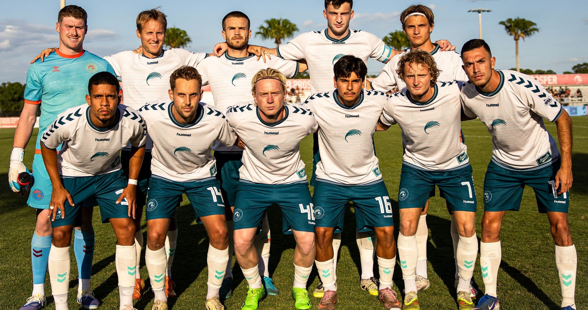 Naples team posing for a group photo