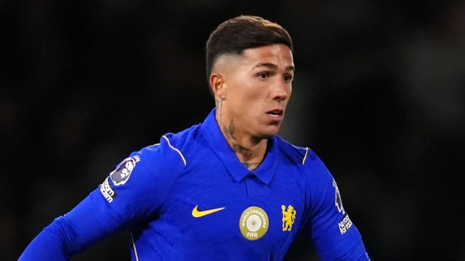 Player in blue Chelsea kit during match action