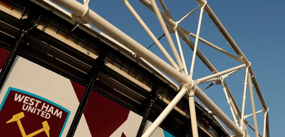 West Ham United stadium exterior with logo visible