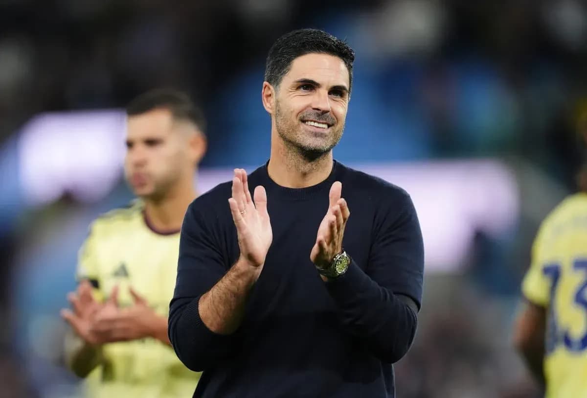 Coach clapping during post-match appreciation