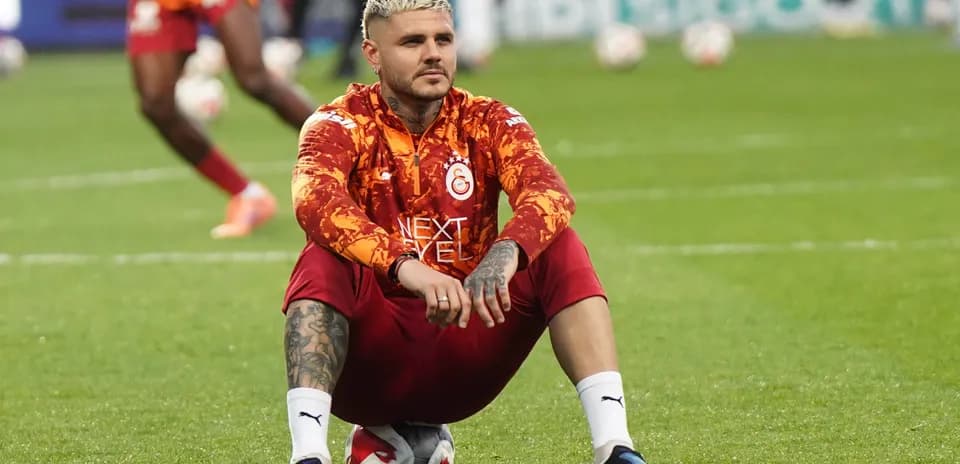 Player sitting on ball during training session