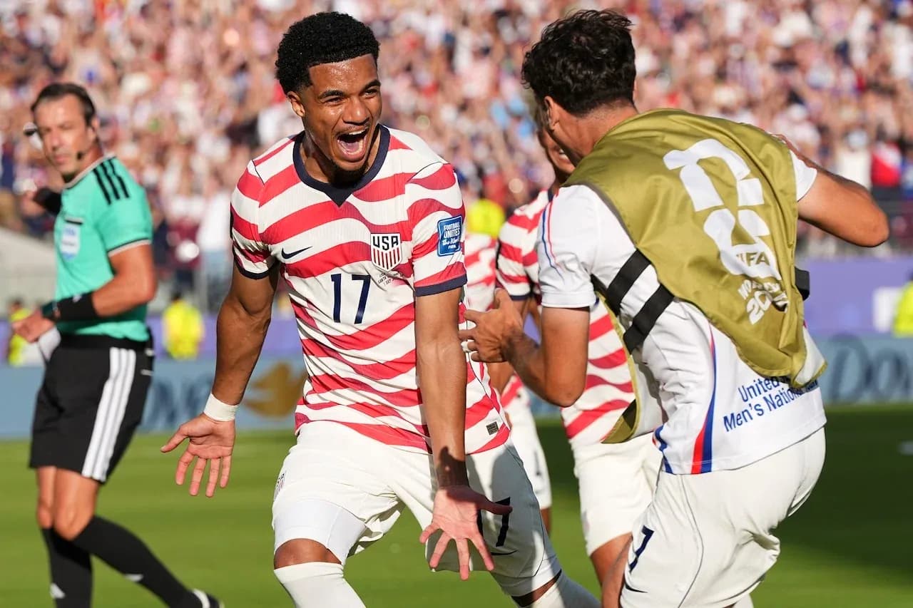 USA players celebrating a goal during World Cup match