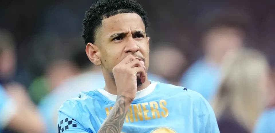 Player in blue jersey contemplating on the field