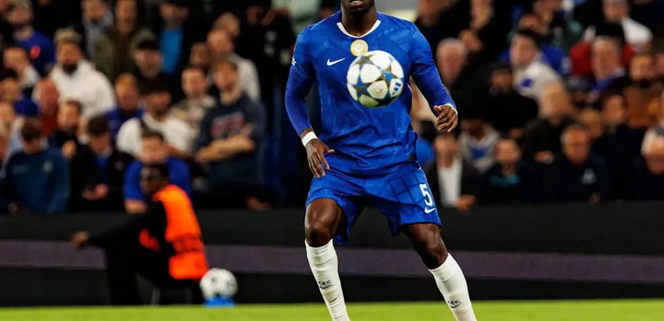 Player in blue kit controlling the ball during match