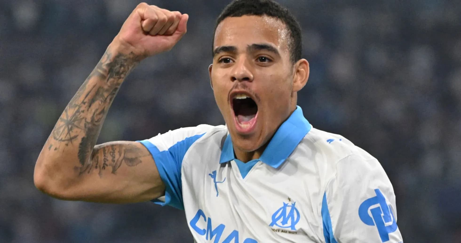 Player celebrating a goal with raised fist
