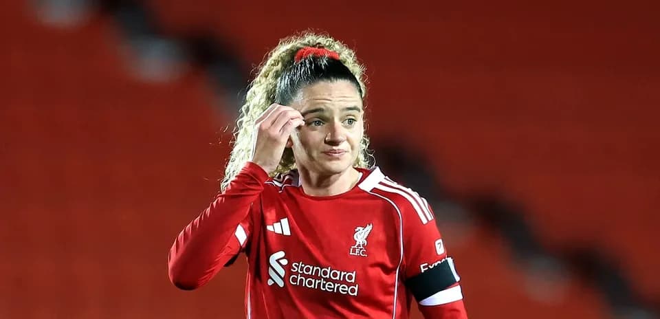 Player in red Liverpool kit on the field