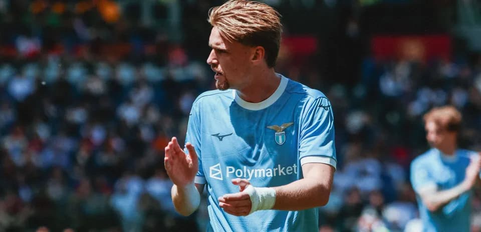 Lazio player applauding during match on field