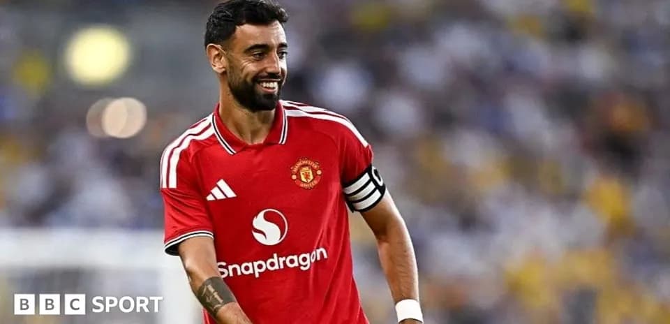 Bruno Fernandes smiling in Manchester United jersey