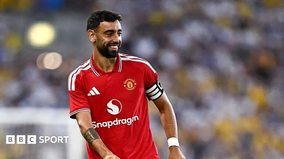 Bruno Fernandes smiling in Manchester United jersey