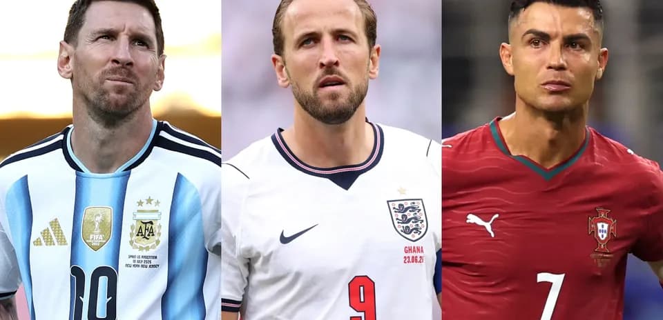Three football players in their national team jerseys