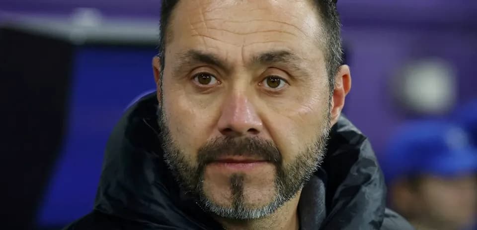 Close-up of a coach during a match