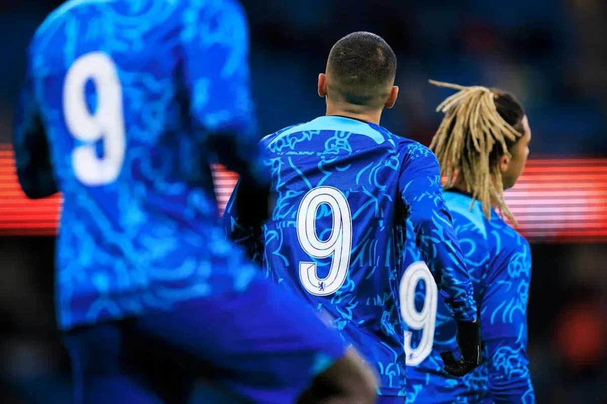 Players wearing blue jerseys with number 9