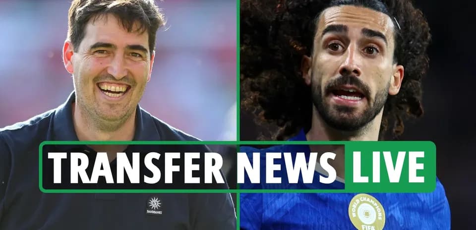 Coach smiling next to player during transfer news update