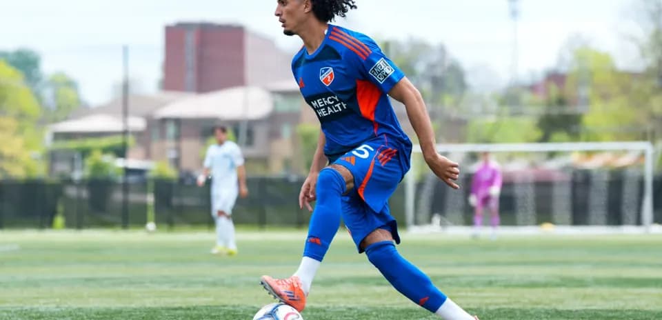 Player dribbling the ball during MLS Next Pro match