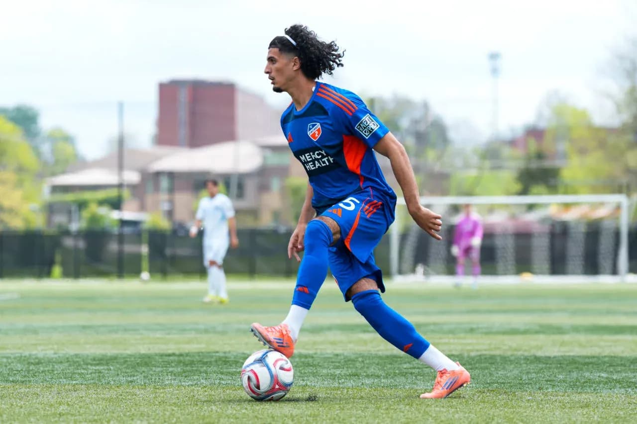 Player dribbling the ball during MLS Next Pro match