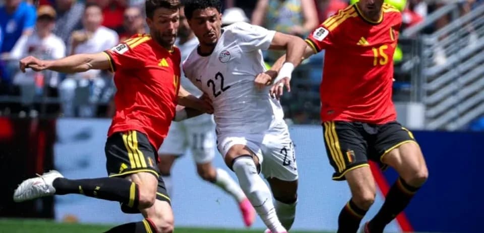 Two players from Belgium challenging an Egyptian player