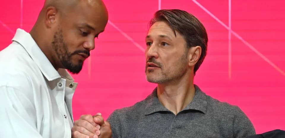 Two men shaking hands at an event
