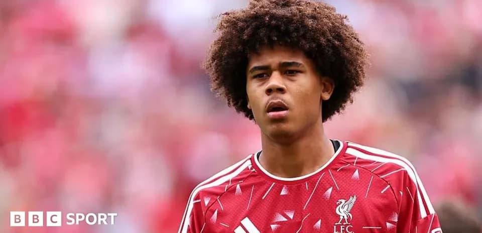 Player in Liverpool jersey during match warm-up