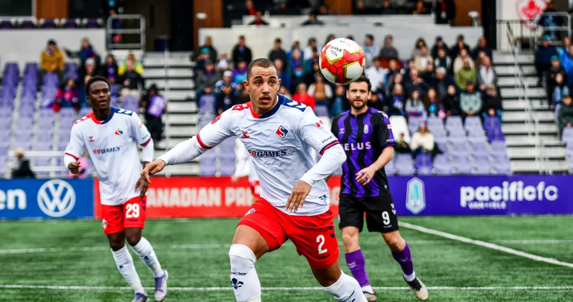 Players competing during Supra du Quebec vs Pacific FC match