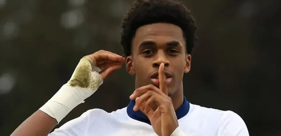 Player gesturing for silence during match celebration