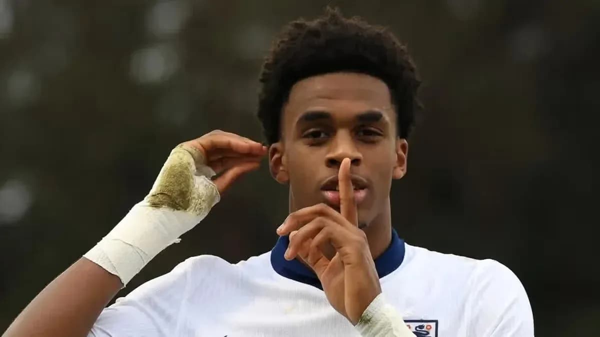 Player gesturing for silence during match celebration
