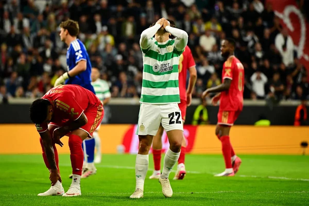 Celtic player reacting after missed opportunity during match