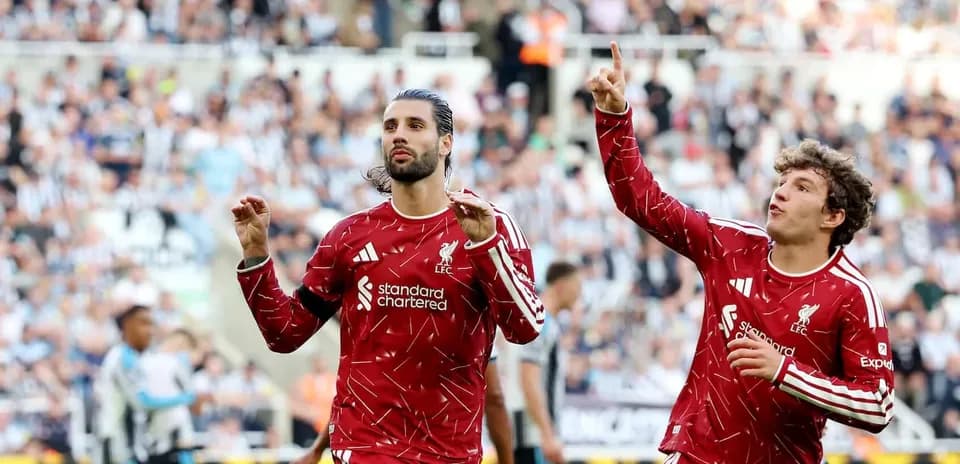 Liverpool players celebrating a goal during match