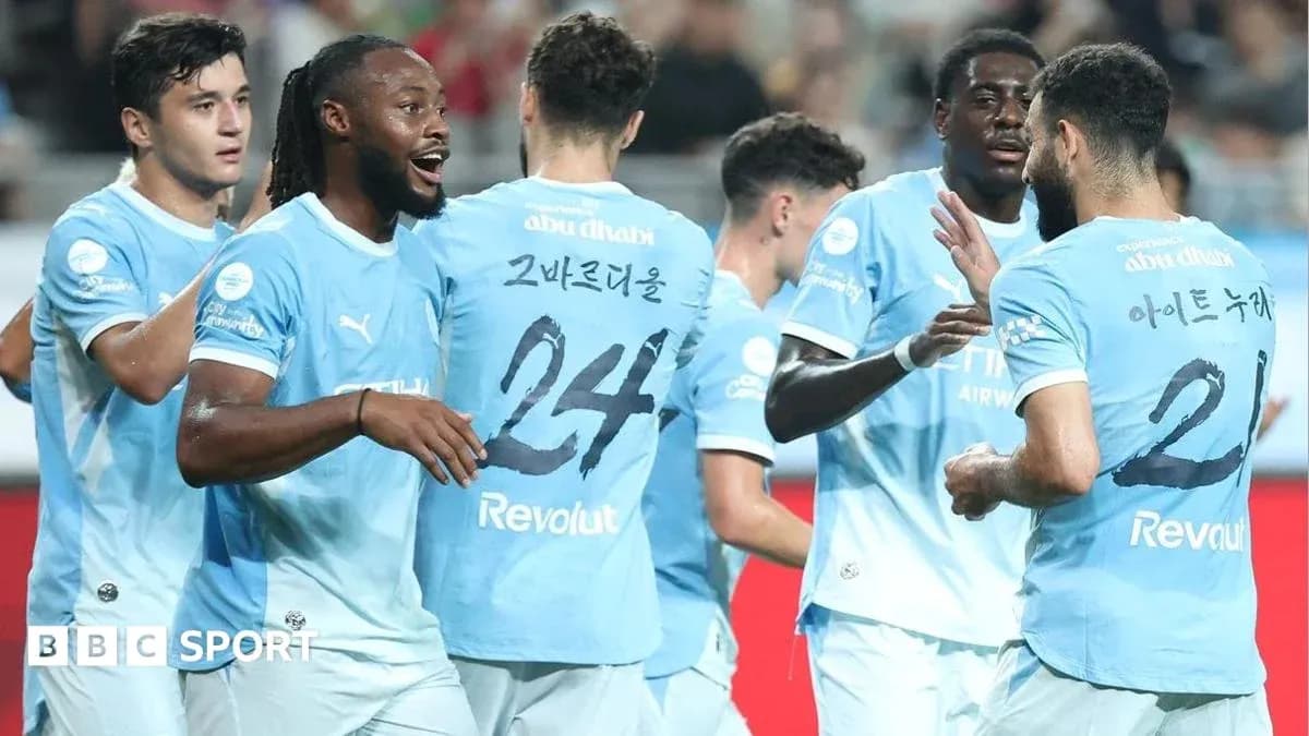Players celebrating a goal during a match