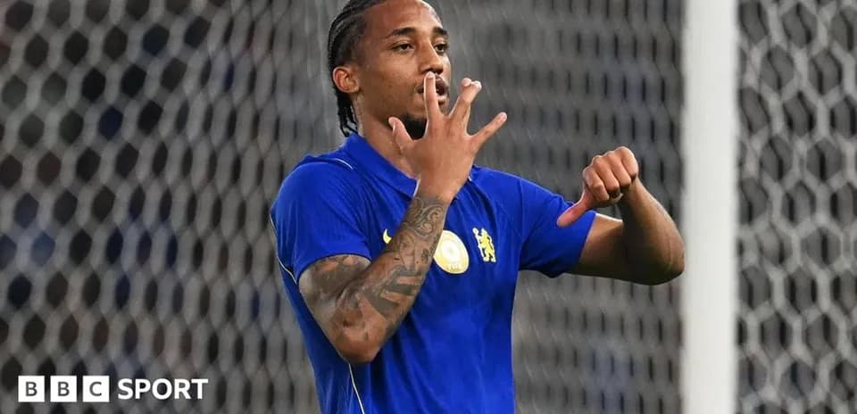 Player celebrating with hand gesture during match