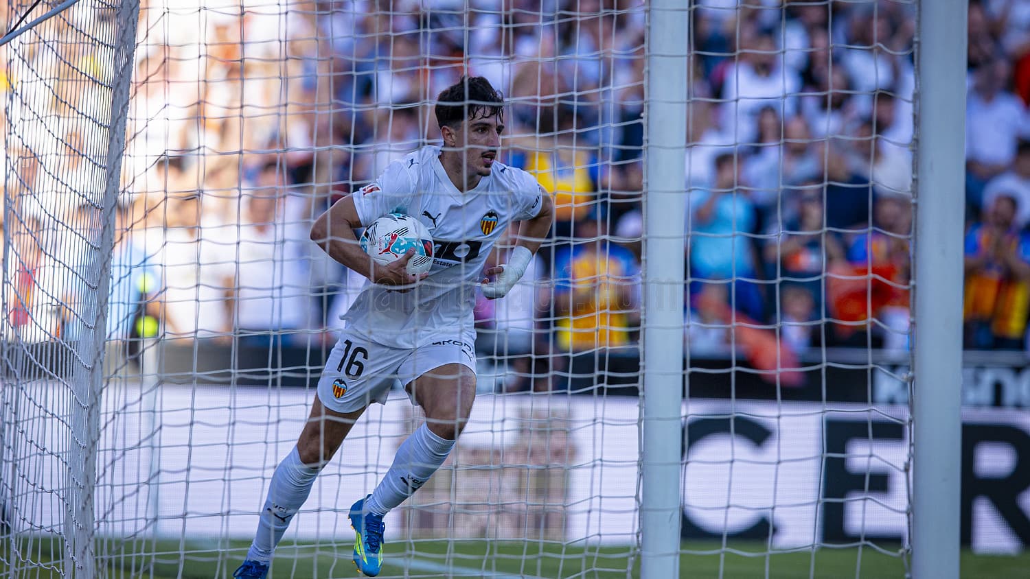 Valencia goalkeeper with the ball during match