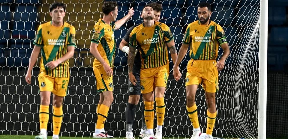 Shamrock Rovers players reacting on the field