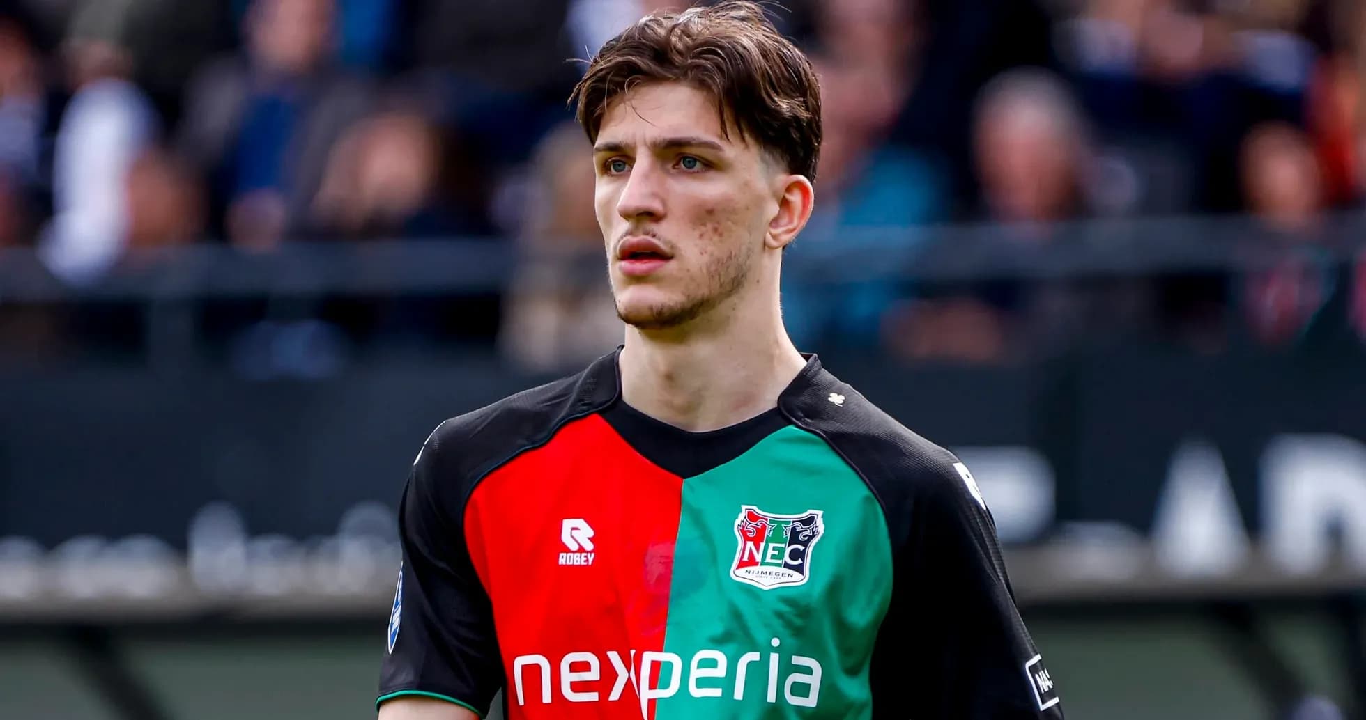 Player in NEC Nijmegen jersey on the field