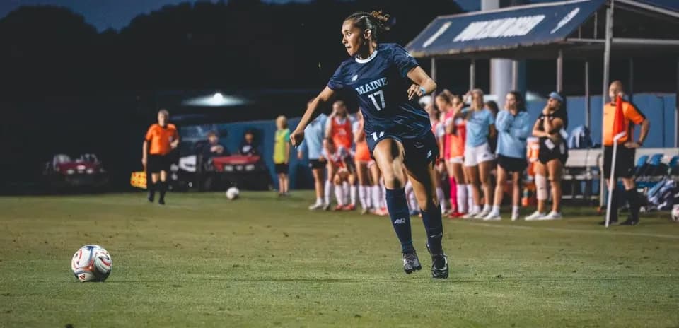 Player from Maine preparing to kick the ball