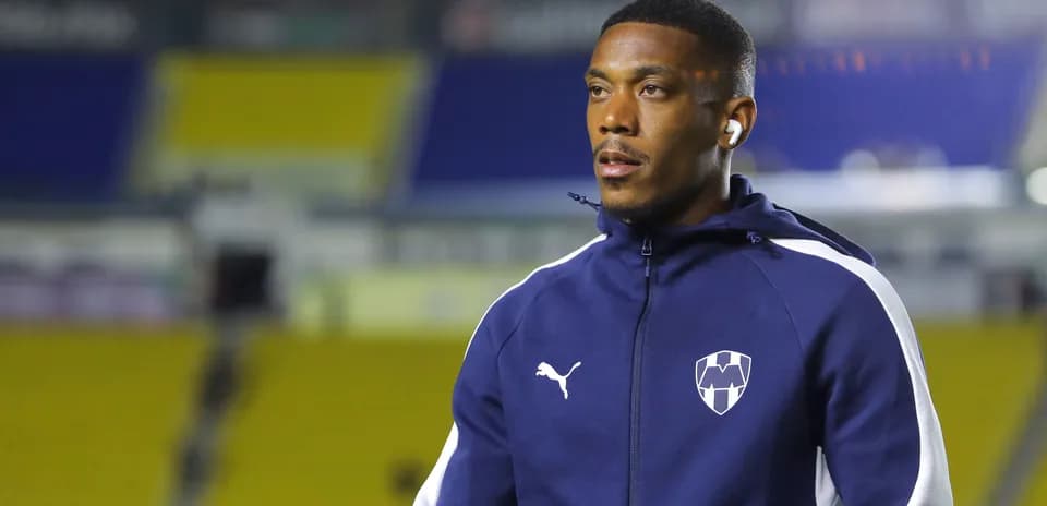 Player wearing team jacket before match