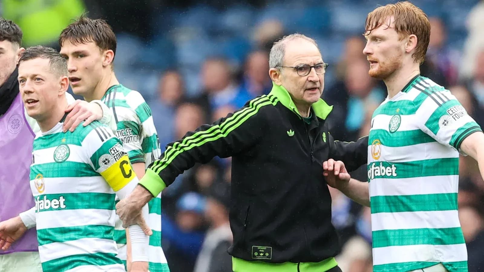 Celtic players and coach during a match confrontation