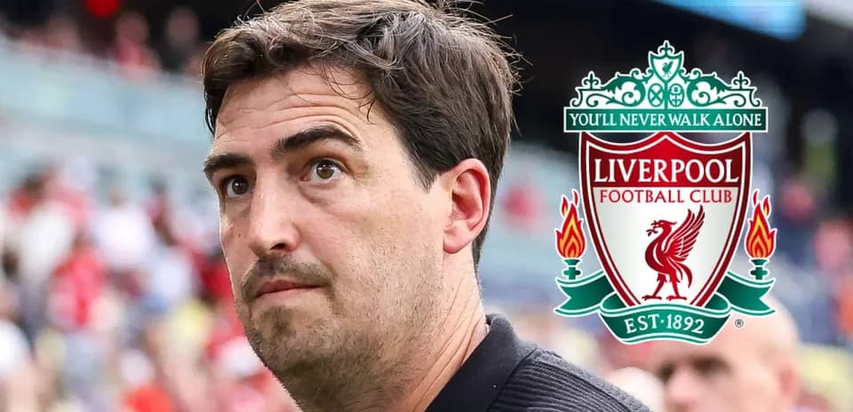 Man observing Liverpool FC logo during event