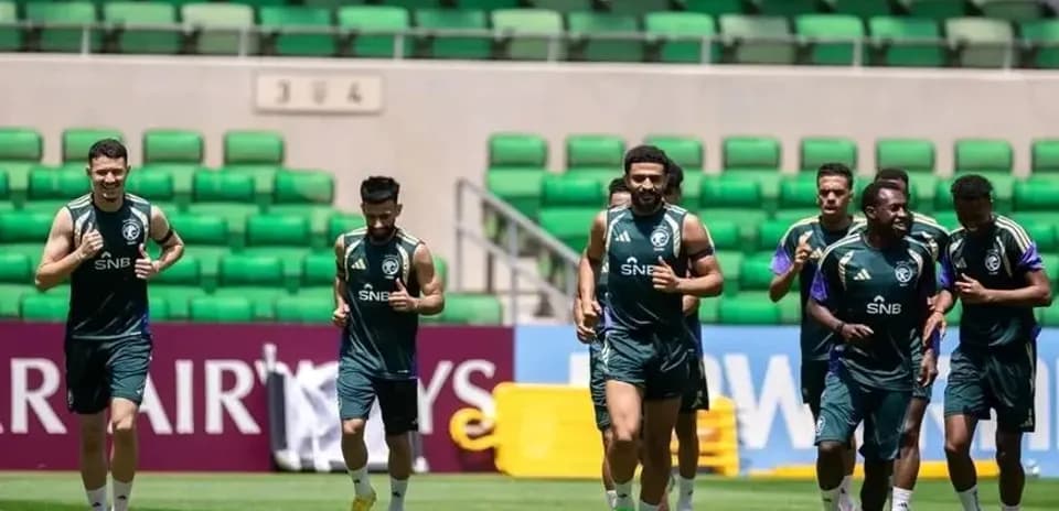Players jogging during training session on field